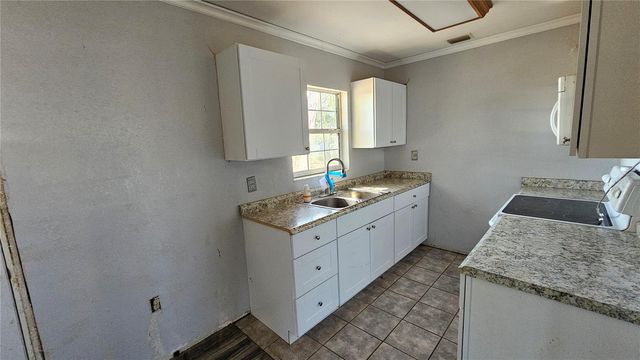 2115 WOODLAND BOULEVARD, Leesburg, FL 34748