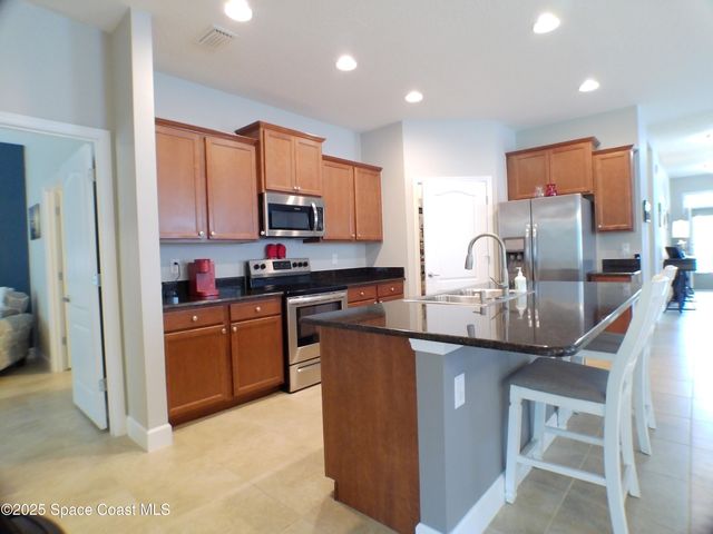 745 Remington Green Drive SE, Palm Bay, FL 32909