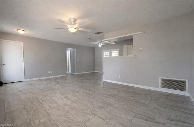 424 Cactus CIR, Lehigh Acres, FL 33936