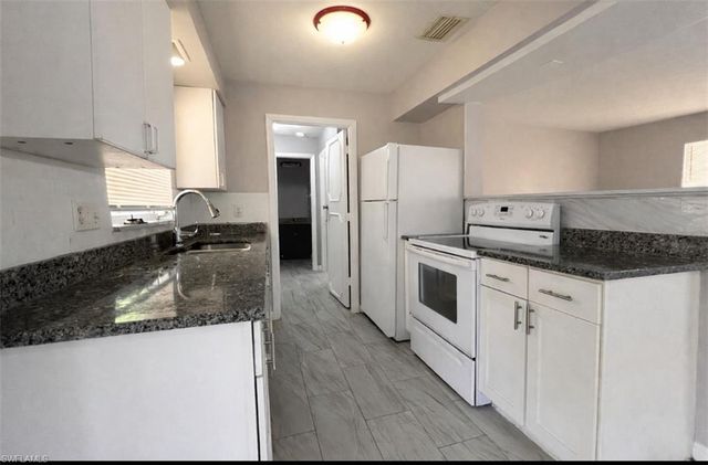 424 Cactus CIR, Lehigh Acres, FL 33936