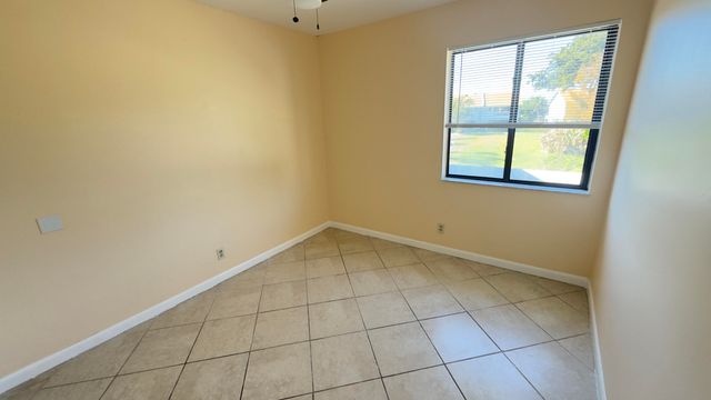 1581 Woodbridge Lakes Circle, West Palm Beach, FL 33406