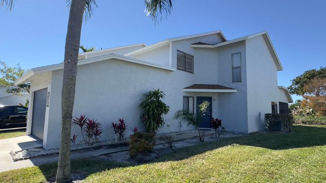 1581 Woodbridge Lakes Circle, West Palm Beach, FL 33406