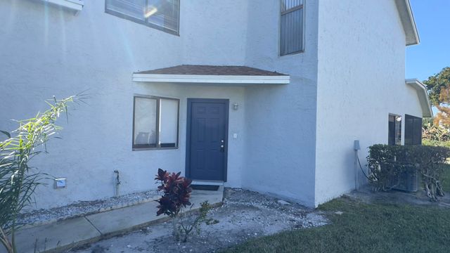 1581 Woodbridge Lakes Circle, West Palm Beach, FL 33406