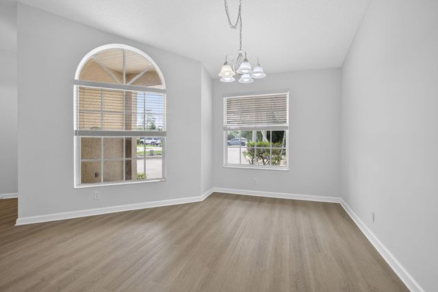 103 Oxford Court, Royal Palm Beach, FL 33411