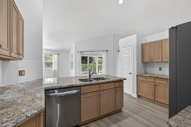 103 Oxford Court, Royal Palm Beach, FL 33411