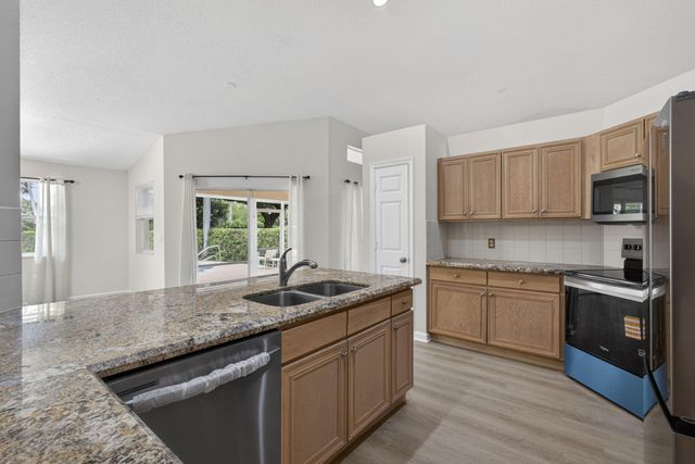 103 Oxford Court, Royal Palm Beach, FL 33411