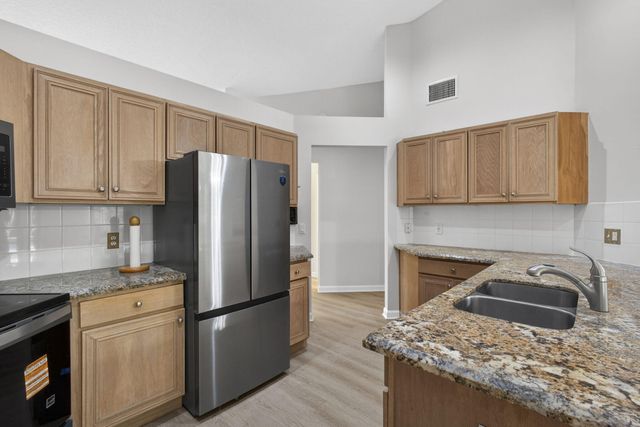 103 Oxford Court, Royal Palm Beach, FL 33411