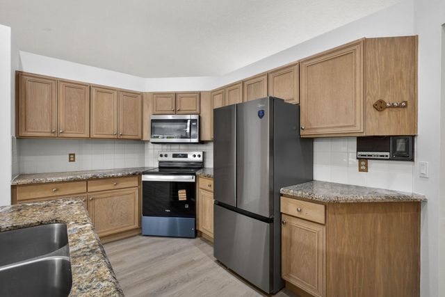 103 Oxford Court, Royal Palm Beach, FL 33411