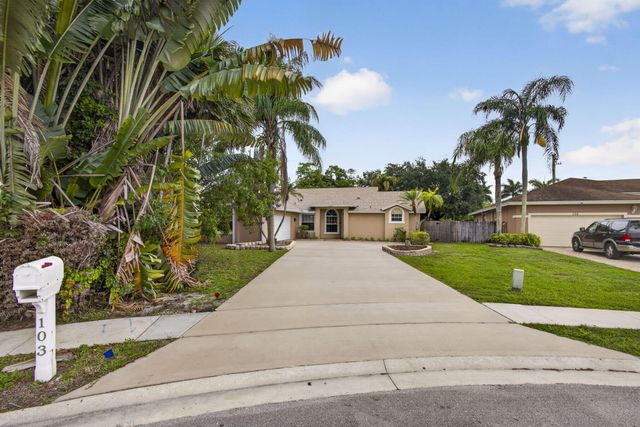 103 Oxford Court, Royal Palm Beach, FL 33411