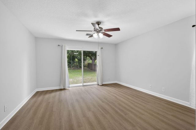 103 Oxford Court, Royal Palm Beach, FL 33411