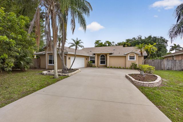 103 Oxford Court, Royal Palm Beach, FL 33411