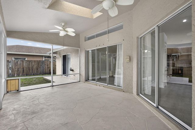 103 Oxford Court, Royal Palm Beach, FL 33411