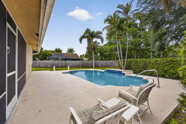 103 Oxford Court, Royal Palm Beach, FL 33411