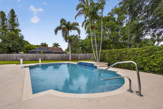 103 Oxford Court, Royal Palm Beach, FL 33411