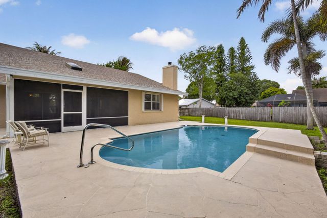 103 Oxford Court, Royal Palm Beach, FL 33411