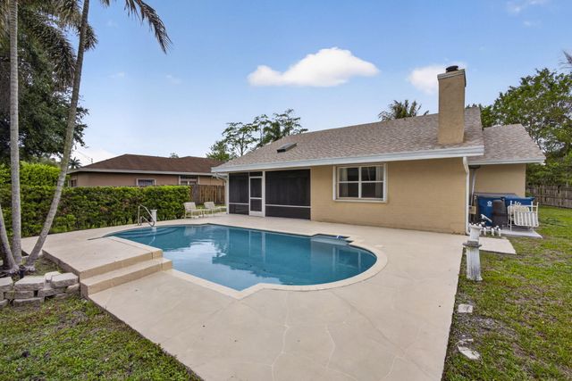 103 Oxford Court, Royal Palm Beach, FL 33411