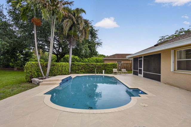 103 Oxford Court, Royal Palm Beach, FL 33411