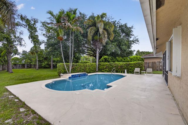 103 Oxford Court, Royal Palm Beach, FL 33411