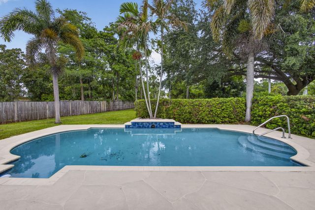 103 Oxford Court, Royal Palm Beach, FL 33411