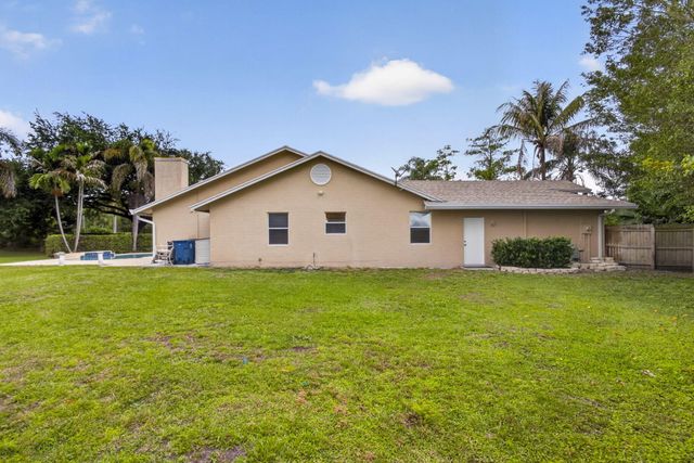 103 Oxford Court, Royal Palm Beach, FL 33411