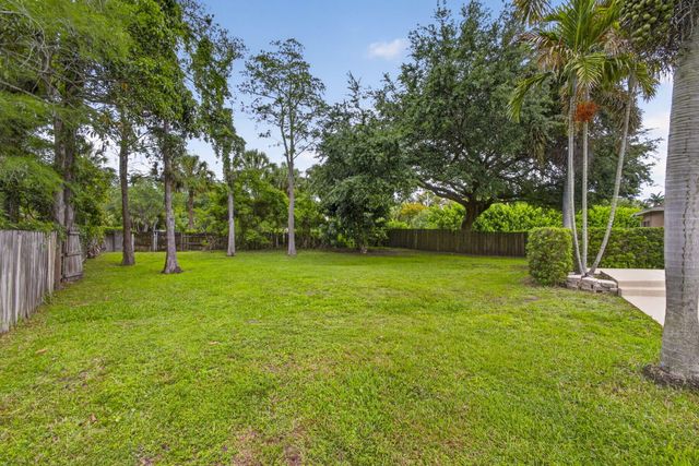 103 Oxford Court, Royal Palm Beach, FL 33411