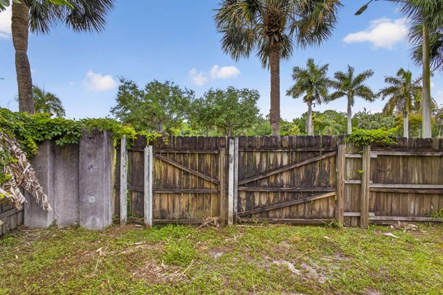 103 Oxford Court, Royal Palm Beach, FL 33411