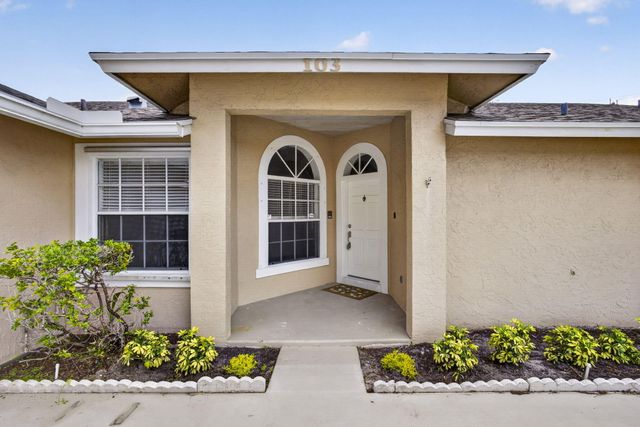 103 Oxford Court, Royal Palm Beach, FL 33411