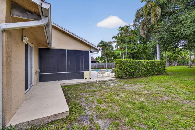 103 Oxford Court, Royal Palm Beach, FL 33411