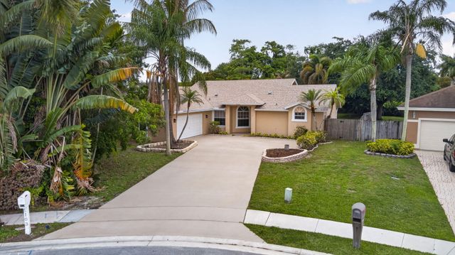 103 Oxford Court, Royal Palm Beach, FL 33411