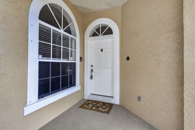 103 Oxford Court, Royal Palm Beach, FL 33411
