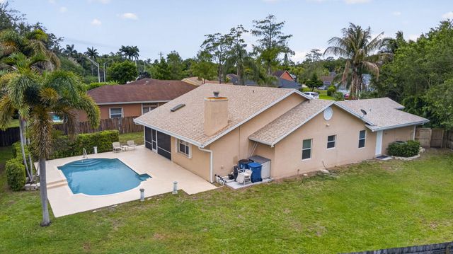 103 Oxford Court, Royal Palm Beach, FL 33411