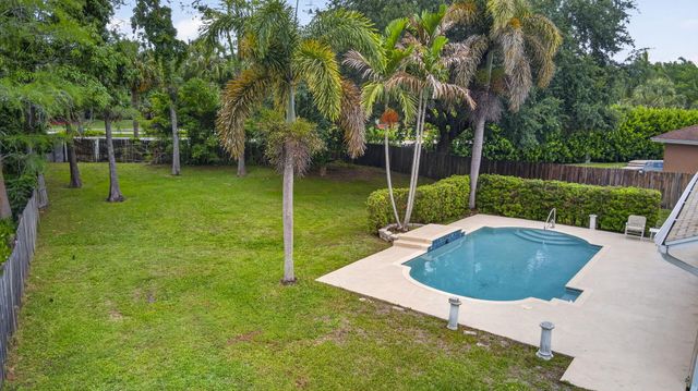 103 Oxford Court, Royal Palm Beach, FL 33411