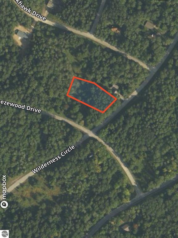Image 1 of property listing at Lot 35 Wilderness Drive, Mancelona, MI 49659