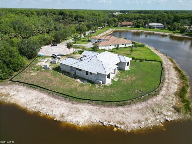 11220 Five Oaks LN, Naples, FL 34120