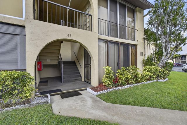 315 Pine Ridge Circle, Greenacres, FL 33463