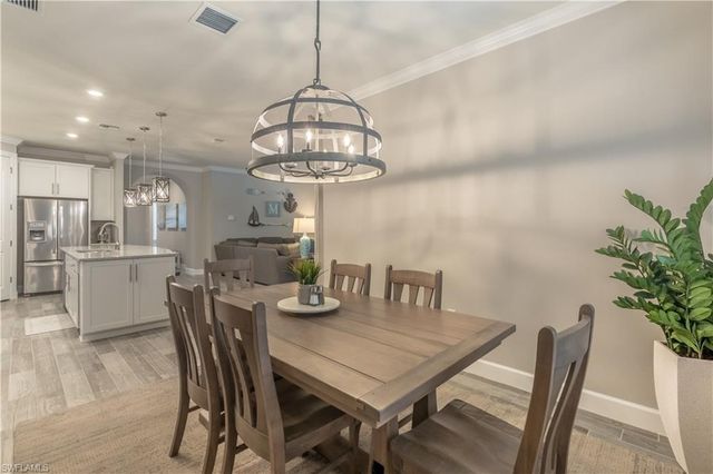 7473 Winding Cypress DR, Naples, FL 34114