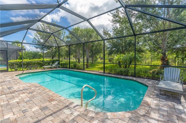 7473 Winding Cypress DR, Naples, FL 34114