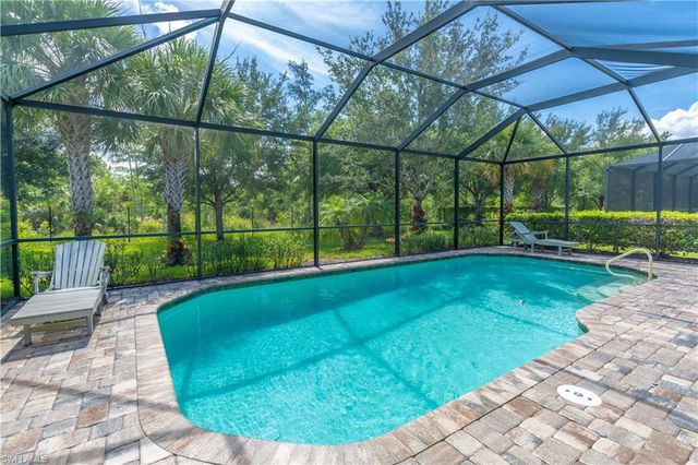 7473 Winding Cypress DR, Naples, FL 34114