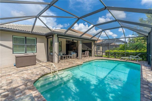 7473 Winding Cypress DR, Naples, FL 34114
