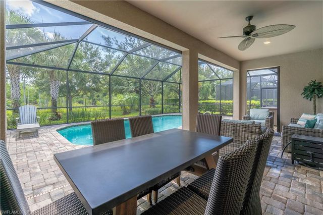 7473 Winding Cypress DR, Naples, FL 34114