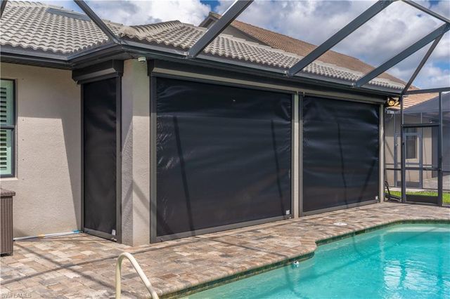 7473 Winding Cypress DR, Naples, FL 34114