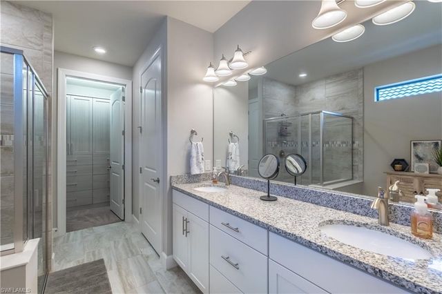 7473 Winding Cypress DR, Naples, FL 34114