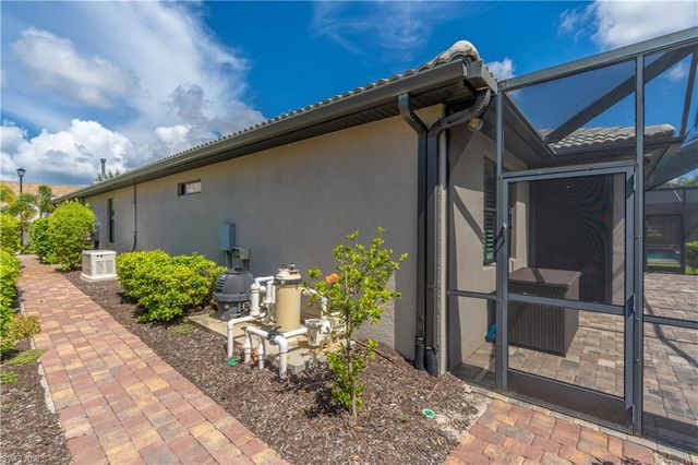 7473 Winding Cypress DR, Naples, FL 34114