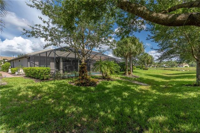7473 Winding Cypress DR, Naples, FL 34114
