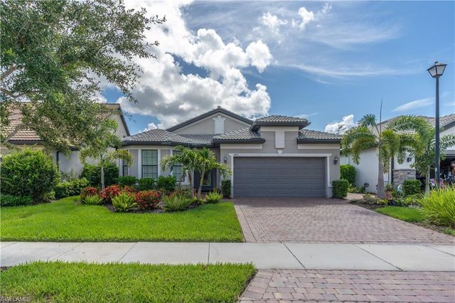7473 Winding Cypress DR, Naples, FL 34114