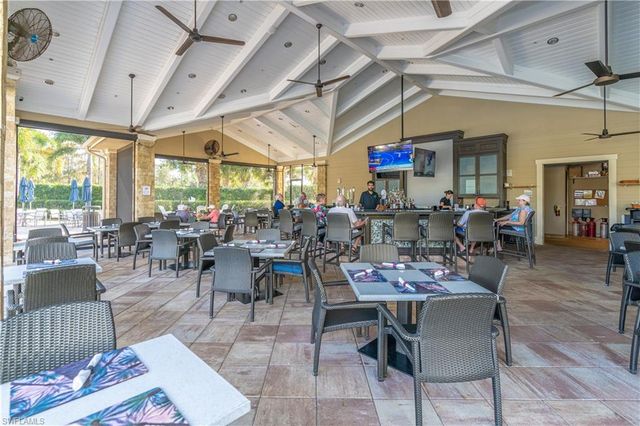 7473 Winding Cypress DR, Naples, FL 34114