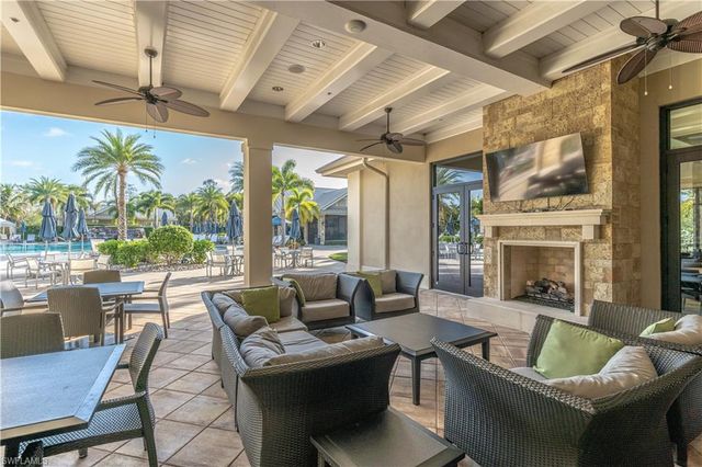 7473 Winding Cypress DR, Naples, FL 34114