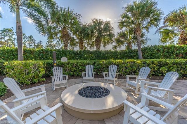 7473 Winding Cypress DR, Naples, FL 34114