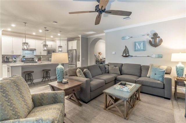 7473 Winding Cypress DR, Naples, FL 34114