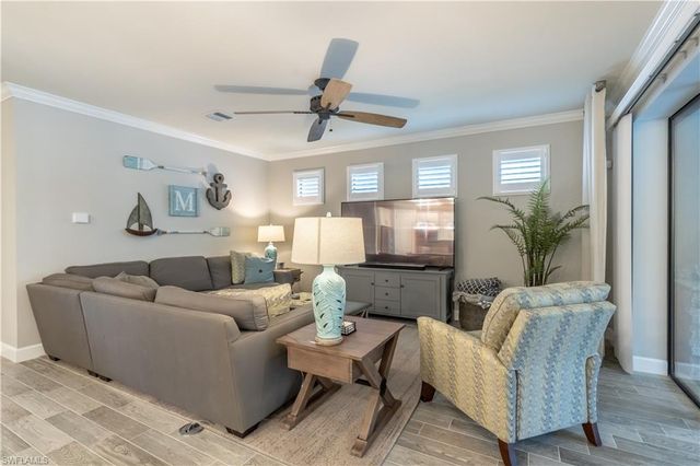 7473 Winding Cypress DR, Naples, FL 34114